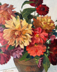 Framed, vintage, still life oil painting of a bouquet of red flowers.