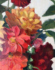 Framed, vintage, still life oil painting of a bouquet of red flowers.