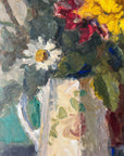 Close up of a framed impressionist oil painting on board of a bouquet of flowers with fruit. Still life art.