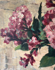 Close up of a vintage oil painting on canvas of a bouquet of dark pink hydrangeas in a glass vase.