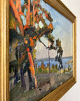 Close up of a framed, vintage oil painting of a landscape with trees and a body of water.