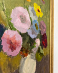 Close up of a framed, vintage, Swedish oil painting of a still life with flowers. Impressionist art.