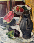Close up of a framed still life oil vintage painting with watermelon, fruit, and jug on a table.