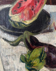Close up of a framed still life oil vintage painting with watermelon, fruit, and jug on a table.