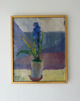 A framed vintage oil painting of a blue hyacinth in a pot. Available at Hue.