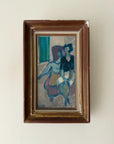 A framed vintage expressionist painting depicting two figures seated indoors on a sofa. Available at Hue.