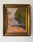 A framed vintage oil painting depicting a coastal scene with a classical building, a large green tree, a sandy path, and distant mountains, housed in an ornate gold frame. Available at Hue.