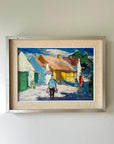 Framed vintage oil painting of a village scene with figures in a vintage frame with linen mount, available at Hue.