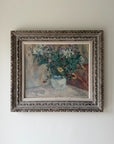 Framed vintage oil painting of a bouquet of flowers in a vase. Available at Hue.