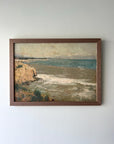 Framed vintage oil painting of a coastal scene in a solid walnut frame, available at Hue