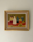 A framed still life oil painting featuring stylized bottles and objects on a table, with a gold frame. Available at Hue.