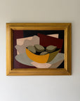 A framed abstract still life oil painting featuring a yellow bowl with fruit. Available at Hue.
