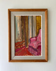 Framed painting of a pink armchair in an interior scene with semi-abstract design, available at Hue