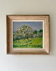Framed painting of a tree with apple blossom in a french frame, available from hue
