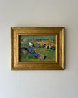 Framed vintage oil painting of a woman sitting on grass at a public gathering. Available at Hue.