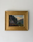 A small framed vinatge landscape oil painting. Available at Hue.