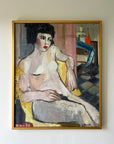 Framed vintage oil painting of a nude figure on a yellow chair in a slim gilt frame, available at Hue.