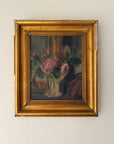 Framed vintage oil painting of a still life with pink roses. Available at Hue.