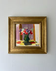 Framed vintage oil painting of a still life with flowers. Available at Hue.