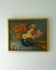 Framed painting of a bouquet of marigold and rose flowers in a vintage frame, available from hue