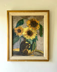 A framed vintage oil painting of a vase of sunflowers in the afternoon light, available at Hue.