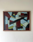 Framed vintage oil abstract artwork with multicolored geometric shapes in a solid walnut frame, available at Hue.