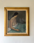 Framed vintage oil painting of a nude woman sitting on a bed with a gold vintage frame, available at Hue.