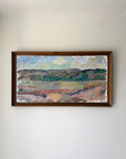 Framed vintage oil landscape painting of fields and distant mountains. Available at Hue.