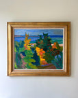 A framed vintage oil painting of a bright coastal scene. Available at Hue.