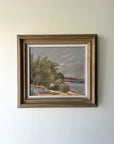 Framed vintage oil painting of a landscape with trees and water. Available at Hue.