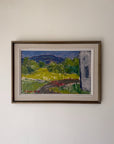 Framed vintage oil painting of a landscape with mountains, meadows and trees. Available at Hue.