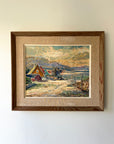 Framed vintage oil painting of a lakeside scene in winter with houses. Available at Hue.