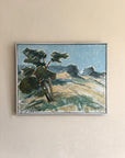 Framed vintage painting of a landscape with trees and mountains, available at Hue.