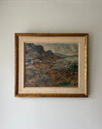 Framed vintage oil painting of a rocky mountain landscape. Available at Hue.