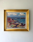 Framed vintage oil painting of a coastal scene with rocky shore. Available at hue.
