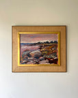 Framed vintage oil painting of a seascape with rocks. Available at Hue.