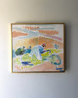 Framed vintage oil painting of a landscape with a person gardening. Available at Hue.
