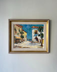Framed vintage oil painting of a French coastal village scene. Available at Hue.