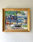 Framed vintage oil painting of a coastal scene with boats and trees in a vintage gilt frame, available at Hue.