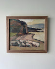 Framed oil painting of a seascape in muted earthy tones framed in a solid walnut frame, available at Hue.