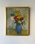Framed vintage oil painting of a blue vase with colourful flowers. Available at Hue.
