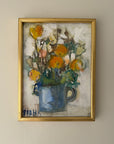 Framed vintage oil painting of yellow and orange flowers in a blue vase. Avaialable at Hue.