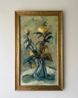 Framed vintage oil painting of yellow flowers in a gilt frame, available at Hue.