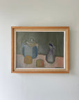 Framed painting of vessels and fruit in a vintage frame, available from hue