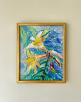 Framed vintage oil painting of lily flowers in a gilt frame, available at Hue.