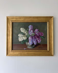 Framed, vintage artwork of purple and white flowers on a dark background, available at Hue.