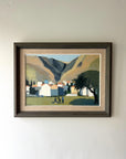 Framed painting of a sunlit mountainous valley landscape with buildings and trees, people and goats, available from hue