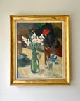 Framed painting of a still life of daffodil and muscari spring flowers on a table in gilt frame, available from hue