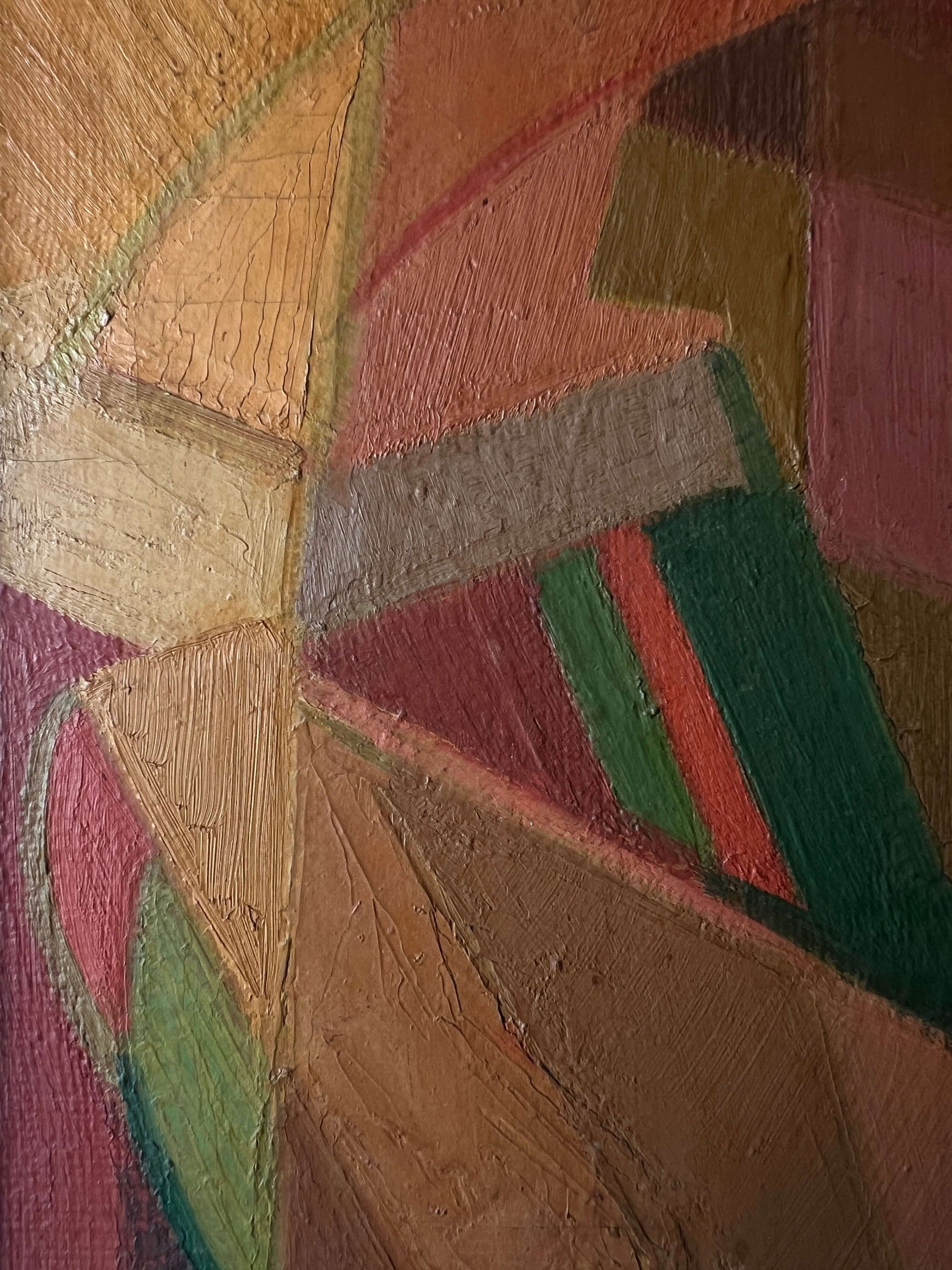 Close up of a vintage abstract oil painting of a female figure painted using geometric shapes in warm ochre colours, reminiscent of a cubist or modernist style.