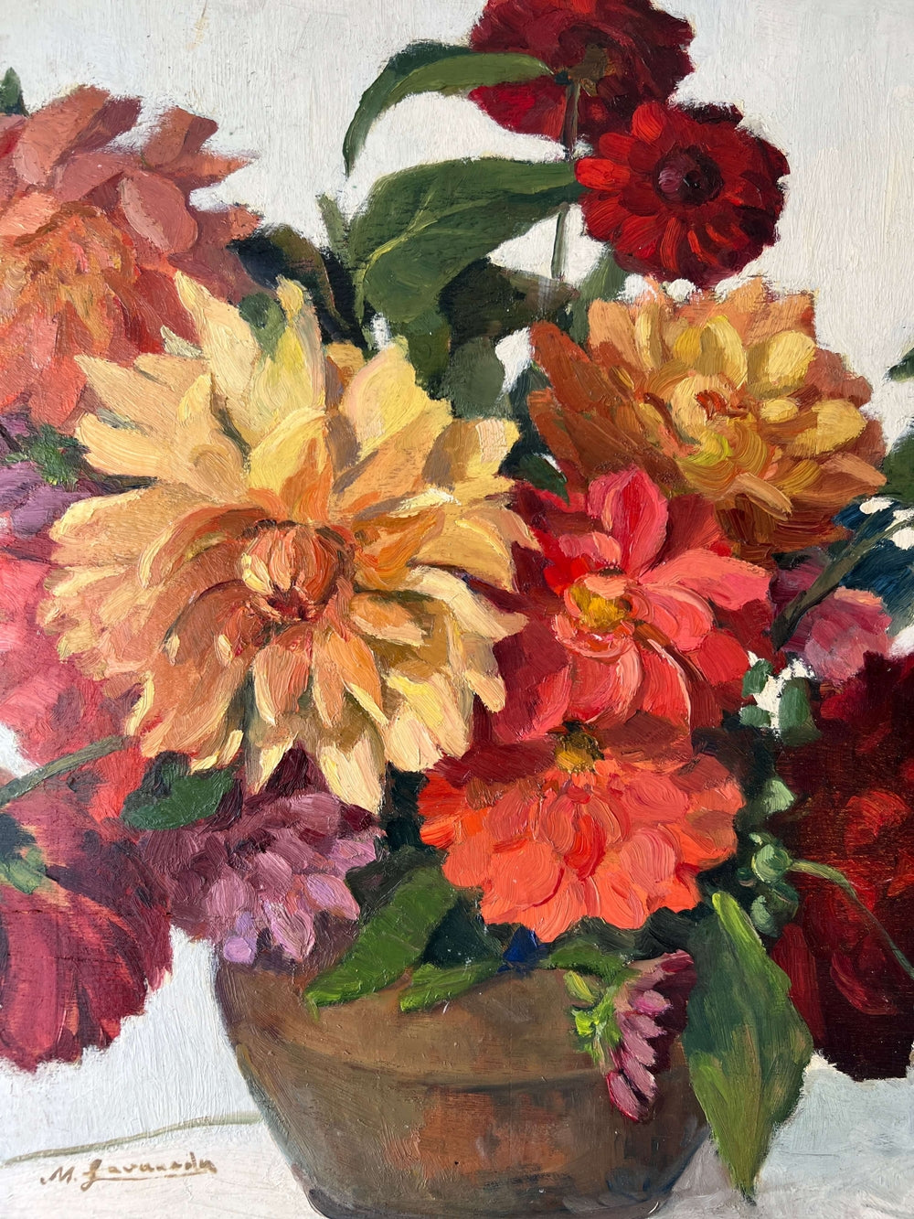 Framed, vintage, still life oil painting of a bouquet of red flowers.
